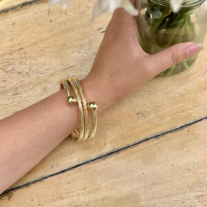 Brazalete tres líneas balín en oro golfi