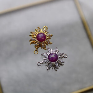Dije sol perla violeta antiestrés con zircones en rodio