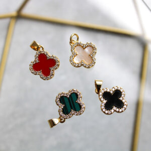 Dije Van Cleef con zircones en rodio