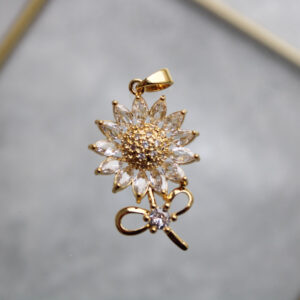 Dije girasol con zircones en rodio