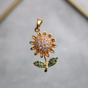 Dije girasol antiestrés con zircones en rodio