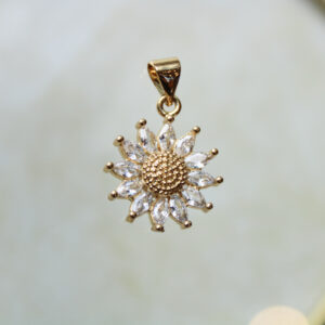 Dije flor con zircones en rodio