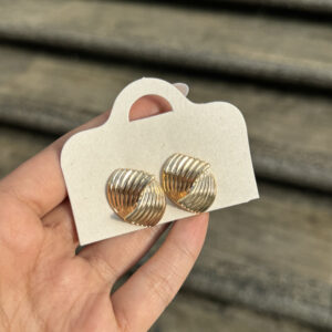 Topo acanalado en oro golfi