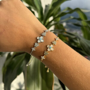 Pulsera flor centro azul y zircones en rodio