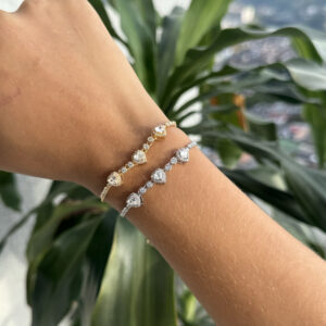 Pulsera corazones doble zircón en rodio