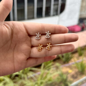 Topo de seguridad flor con zircones en rodio