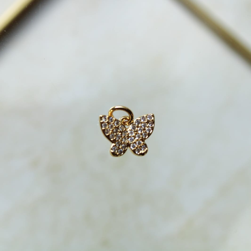 Dije mariposa con zircones en rodio
