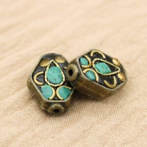 Tibetano hexagonal de 14 mm de largo en bronce